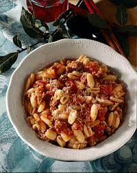 RagĂš di Capretto con Pecorino Sardo e Gnochetti